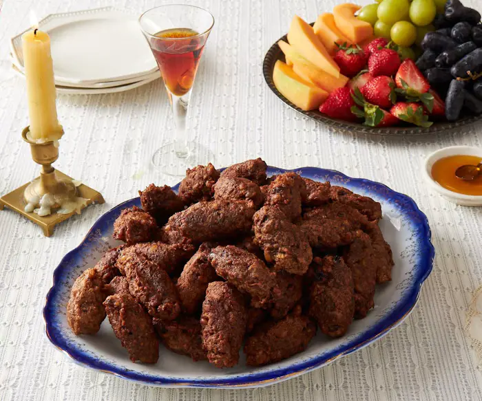 Pizzarelle (Matzo, Cocoa, and Raisin Fritters) image